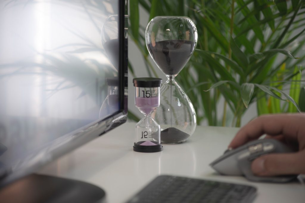 TimeClick - Employee Time Tracking - Hour Glass On Employee Desk